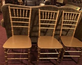 Gold-tone Chiavari, Chiavarina, Tiffany Chairs. Lot of 4 .