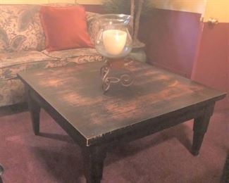 Distressed style wooden coffee table.