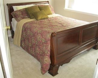 Sleigh bed, queen size with headboard, foot board and rails.