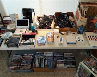 vinyl records, CDs, portable DVD players, routers
