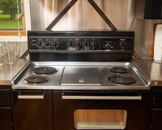 Kenmore Gourmet  Edition 40" wide x 24" deep x 36" high range at cooking surface. Back of stove where knobs are, is 48" high.