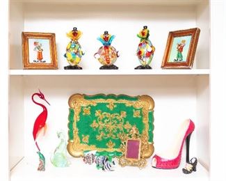 Glass crane on bottom shelf is sold.