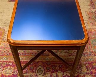 Table with blue vintage glass top