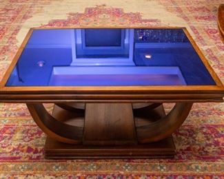 Coffee table with blue vintage glass top