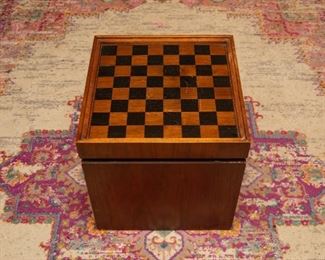 Chess board ottoman with plastic chess pieces