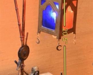 Item 8: Austrian cold painted Orientalist bronze lamp, in the style of Franz Bergman. $1200 No foundry marks or signatures present (green felt removed from base to check). In good condition. Glass appears to be original. One small split in metal on upright - see photo.