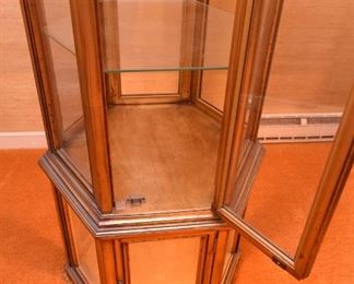 Item 11: Gold leaf six-sided curio cabinet. $225    Wood frame with gold leaf look. All glass panels and shelves are in excellent condition, no chips or cracks. Minor wear. Overall very good condition. 