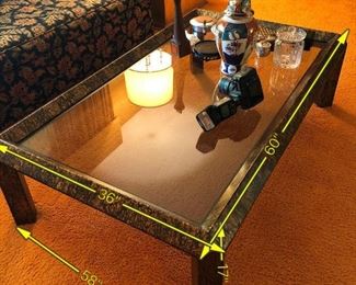 Item 14: Glass top coffee table: $185 Wood frame, painted in drippy metallic paints. Gold, bronze, copper tones. Very good condition