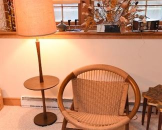 Item 15: Ringstol Chair $500 Stamped "Made in Denmark" in red on underside. All four legs have water damage, as shown.