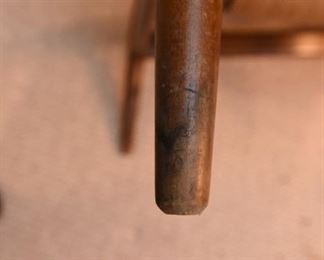 Item 15: Ringstol Chair $500 Stamped "Made in Denmark" in red on underside. All four legs have water damage, as shown.