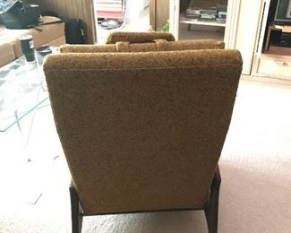 Item 16: Adrian Pearsall for Craft Associates Recliner $385 Highback cushioned recliner upholstered in nubby mustard fabric. Weighted strap headrest present. Reclining mechanism in good working order. Upholstery appears to be in good condition, but the entire chair needs a deep clean to get the dust out.