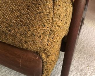 Item 16: Adrian Pearsall for Craft Associates Recliner $385 Highback cushioned recliner upholstered in nubby mustard fabric. Weighted strap headrest present. Reclining mechanism in good working order. Upholstery appears to be in good condition, but the entire chair needs a deep clean to get the dust out.
