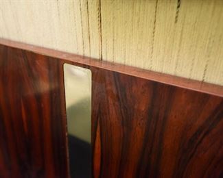 Item 20: Rosewood King Headboard: $225 Rosewood panels separated by recessed chrome strips, surrounded by black laminated wood. Fair condition.