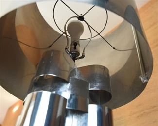 Item 29: Monumental Curtis Jeré Chrome Lamp $385 Minor dings in barrel shade. Base has had paint loss, spot repairs are visible. Some areas of chrome need to be polished after a deep clean.