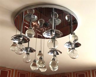 Item 30: Vintage Lightolier Chrome Bubbles Chandelier $525 This five-light, flush-mount chandelier should have five glass globes. I haven't found them yet in the house but will keep looking.
