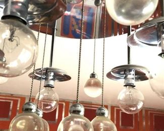 Item 30: Vintage Lightolier Chrome Bubbles Chandelier $525 This five-light, flush-mount chandelier should have five glass globes. I haven't found them yet in the house but will keep looking.