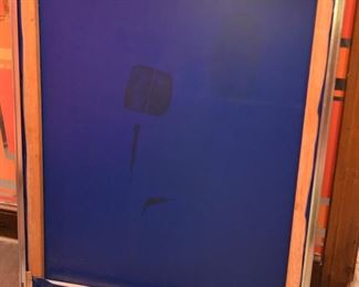 Item 31: Abstract Tina Roy Painting $475 Mixed media on blue synthetic material. Signed top right.