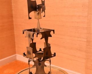 Item 42: Brutalist metal sculpture $45 Abstract shape tower.