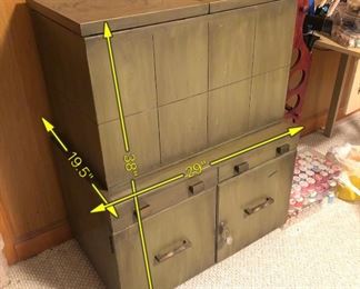 Item 46: Bar cabient $95 Weathered green midcentury brutalist bar cabinet has locking storage in the bottom. The top flips open to lift up a shelf with storage for differnt size drinkware. Even has small scale hydraulics to allow the shelf to sink back in gently and close softly. There's enough overall wear and damage from use that this will be a project.