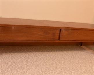 Item 49: Low Rider Coffee Table $165 Unmarked, 2-drawer coffee table, finished on all sides to give you lots of placement options. Some water damage on top, as shown. Overall good condition.