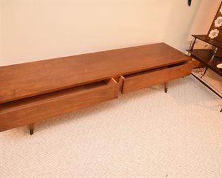 Item 49: Low Rider Coffee Table $165 Unmarked, 2-drawer coffee table, finished on all sides to give you lots of placement options. Some water damage on top, as shown. Overall good condition.