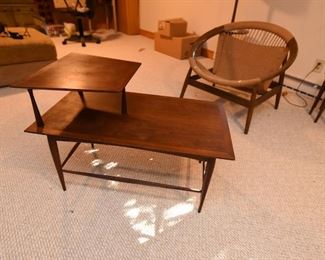Item 50: Two-tier Rosewood End Table $70 Unmarked end table with particularly slim supports. Wood is in good condition, some minor water damage on surface.