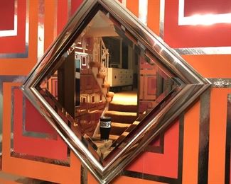 Item 56: Chrome frame square mirror $120