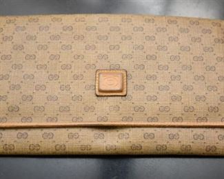 Item 67: Vintage Gucci Wallet Clutch $25 Wear especially evident on corners. Interior pockets are marked up from coins and pens.