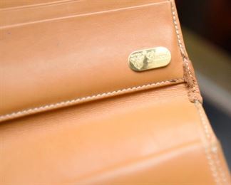 Item 67: Vintage Gucci Wallet Clutch $25 Wear especially evident on corners. Interior pockets are marked up from coins and pens.