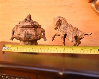 ITEM 73: Two Chinese Bronze Items $30 Small patinated cache pot and war horse.
