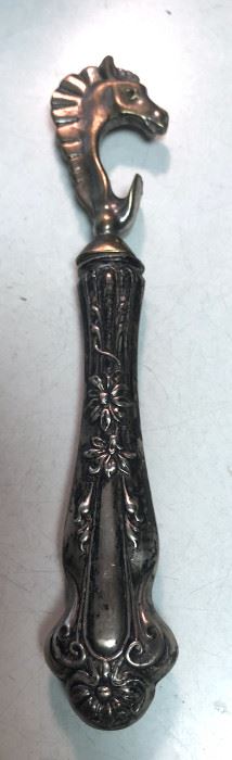 ITEM 87: Sterling handle, brass horse head bottle opener $12