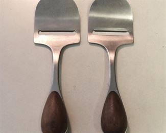 ITEM 97: Pair of Dansk Torun Mid Century Stainless Steel and Teak Cheese Planes $15
