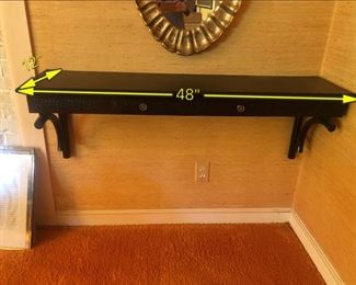 ITEM 115: Wall-mount black shelf $55 Faux bamboo trim, caned-look front panels. One drawer. Laminate on top is lifting on back left corner. Easily fixed with wood glue, a clamp, and 24 hours.