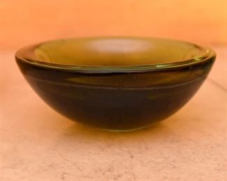 ITEM 120: Three Art Glass Bowls $55 L to R: Thick glass bowl with bubbles. The Interior has layers of orange glass and crackled gold encased in clear glass; green-brown shallow glass bowl; sea-green ribbed glass tri-form bowl.