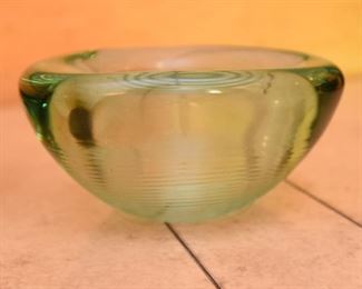 ITEM 120: Three Art Glass Bowls $55 L to R: Thick glass bowl with bubbles. The Interior has layers of orange glass and crackled gold encased in clear glass; green-brown shallow glass bowl; sea-green ribbed glass tri-form bowl.