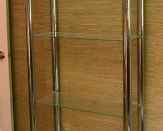 ITEM 129: Chrome and Glass Etagere $125 Five-shelf unit. Glass shelves are free of chips or cracks. Chrome is in very good condition.