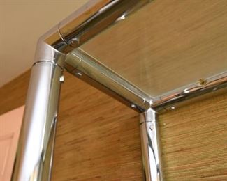 ITEM 129: Chrome and Glass Etagere $125 Five-shelf unit. Glass shelves are free of chips or cracks. Chrome is in very good condition.