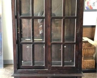 Full Glass Curio with Dark Stain and Siding Doors
