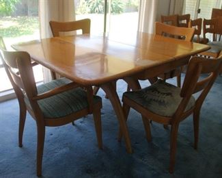 #4   $800.00.   Heywood Wakefield. wish bone table with 8 dog bone chairs Rough condition needs to be completely redone  