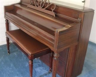 #34 Chickering upright piano $200.00