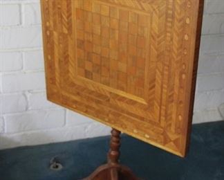 #35 Tilt top checker / chess table wobbly $50.00
