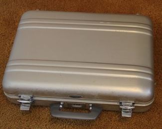 #82 Haliburton suitcase  $20.00