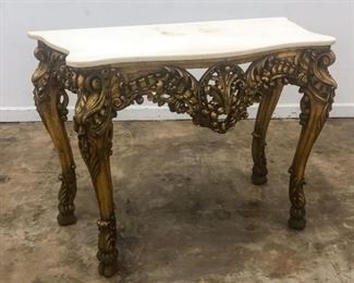 https://www.liveauctioneers.com/item/85207271_19th-c-carved-and-giltwood-marble-top-console-table