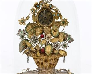 https://www.liveauctioneers.com/item/85207297_19th-c-french-gilt-desk-clock-flower-basket-form