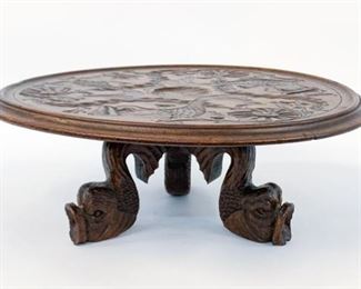 https://www.liveauctioneers.com/item/85207418_19th-c-english-dolphin-form-carved-oak-lazy-susan
