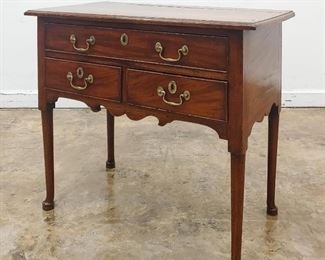 https://www.liveauctioneers.com/item/85207430_george-iii-period-mahogany-three-drawer-lowboy