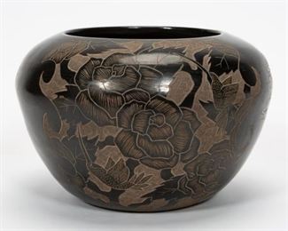 https://www.liveauctioneers.com/item/85207514_gwen-tafoya-santa-clara-blackware-pottery-bowl