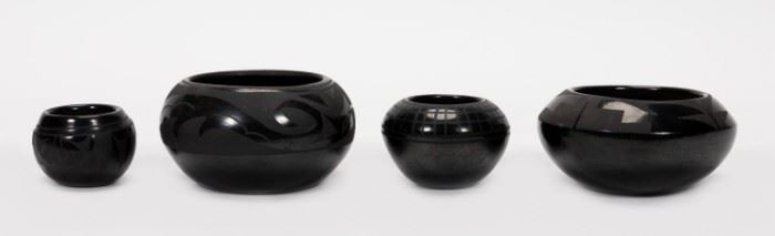 https://www.liveauctioneers.com/item/85207515_four-unsigned-santa-clara-blackware-pottery-vases