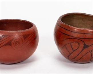 https://www.liveauctioneers.com/item/85207517_2-jemez-native-american-red-and-black-pottery-vases