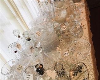 tables filled with early wheel cut crystal